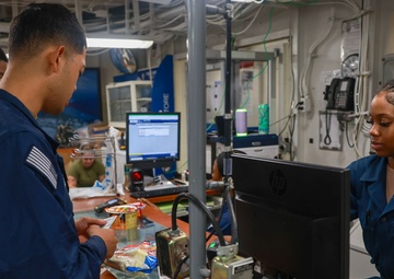 USS Iwo Jima Sailors Utilize Ship Store