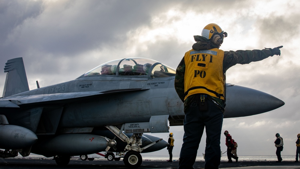 USS Gerald R. Ford (CVN 78) Sailor Signals To Aircraft