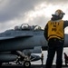 USS Gerald R. Ford (CVN 78) Sailor Signals To Aircraft
