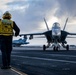 USS Gerald R. Ford (CVN 78) Sailor Signals To Aircraft