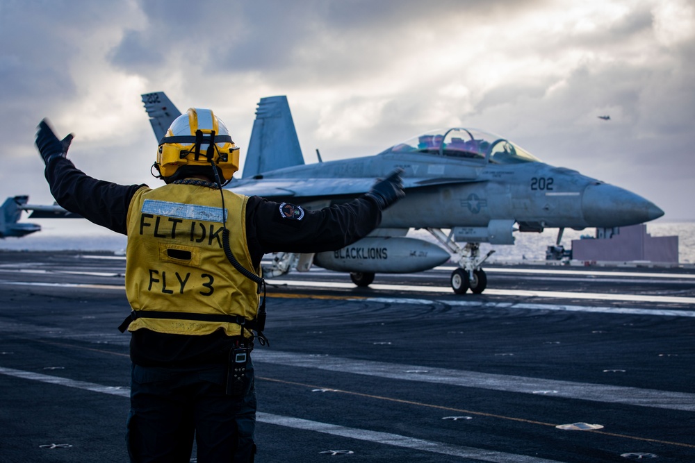 USS Gerald R. Ford (CVN 78) Sailor Signals To Aircraft