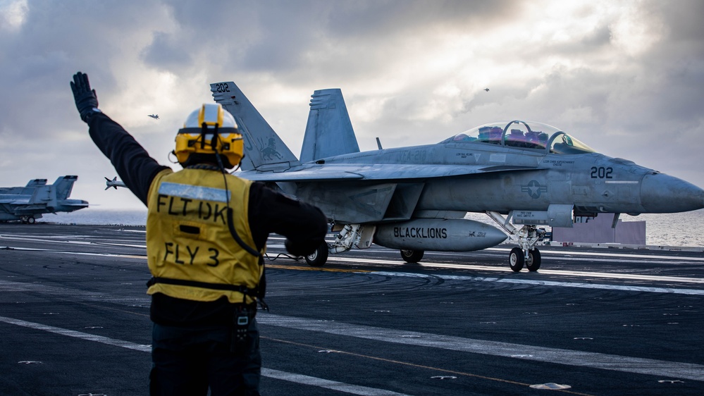 USS Gerald R. Ford (CVN 78) Sailor Signals To Aircraft