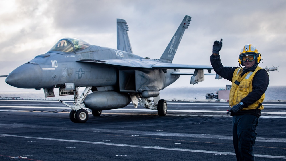 USS Gerald R. Ford (CVN 78) Sailor Signals To Aircraft