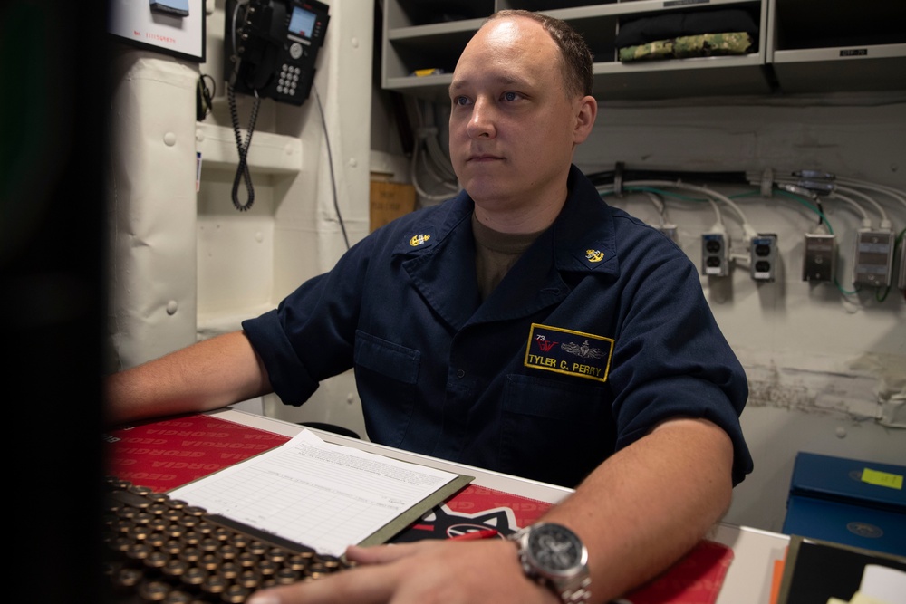 George Washington Sailors Conduct Administrative Work