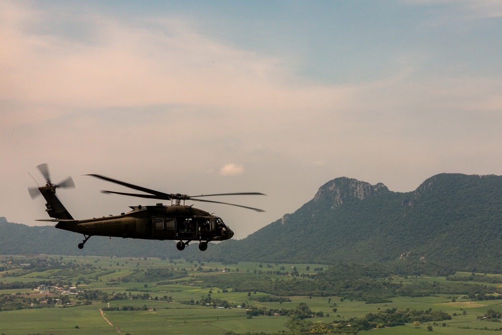Washington Army National Guard UH-60 Blackhawks conduct first flight in Thailand.