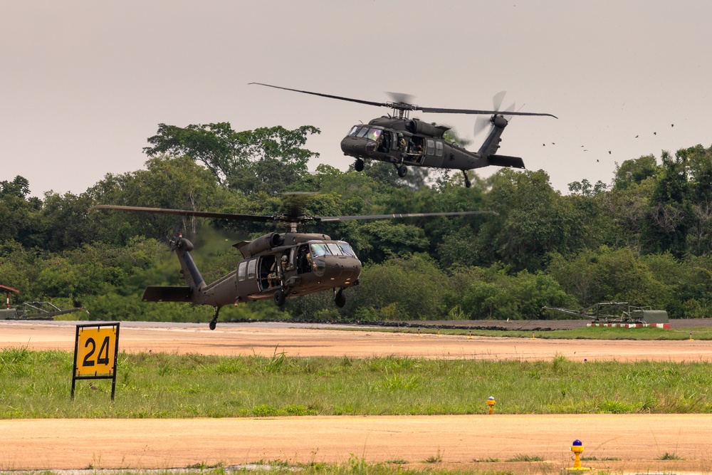 Washington Army National Guard UH-60 Blackhawks conduct first flight in Thailand.