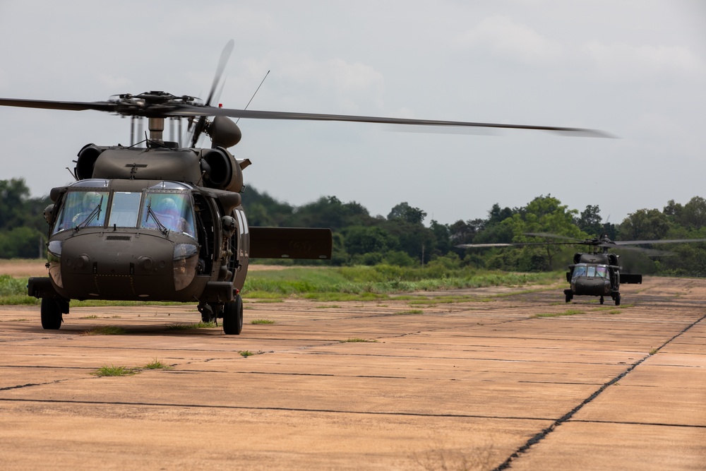 Washington Army National Guard UH-60 Blackhawks conduct first flight in Thailand.
