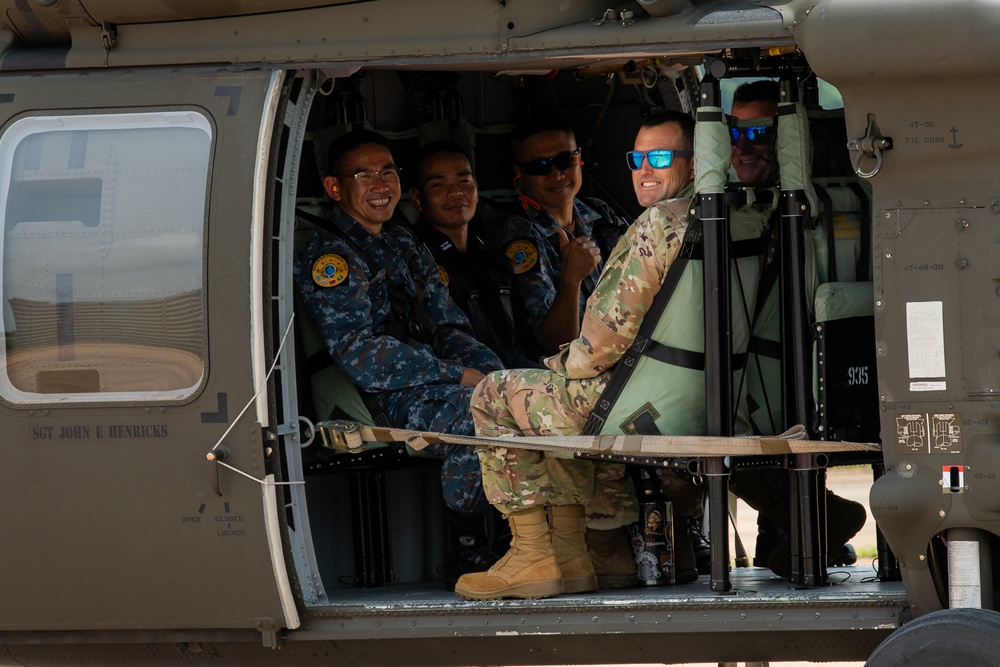 Washington Army National Guard UH-60 Blackhawks conduct first flight in Thailand.