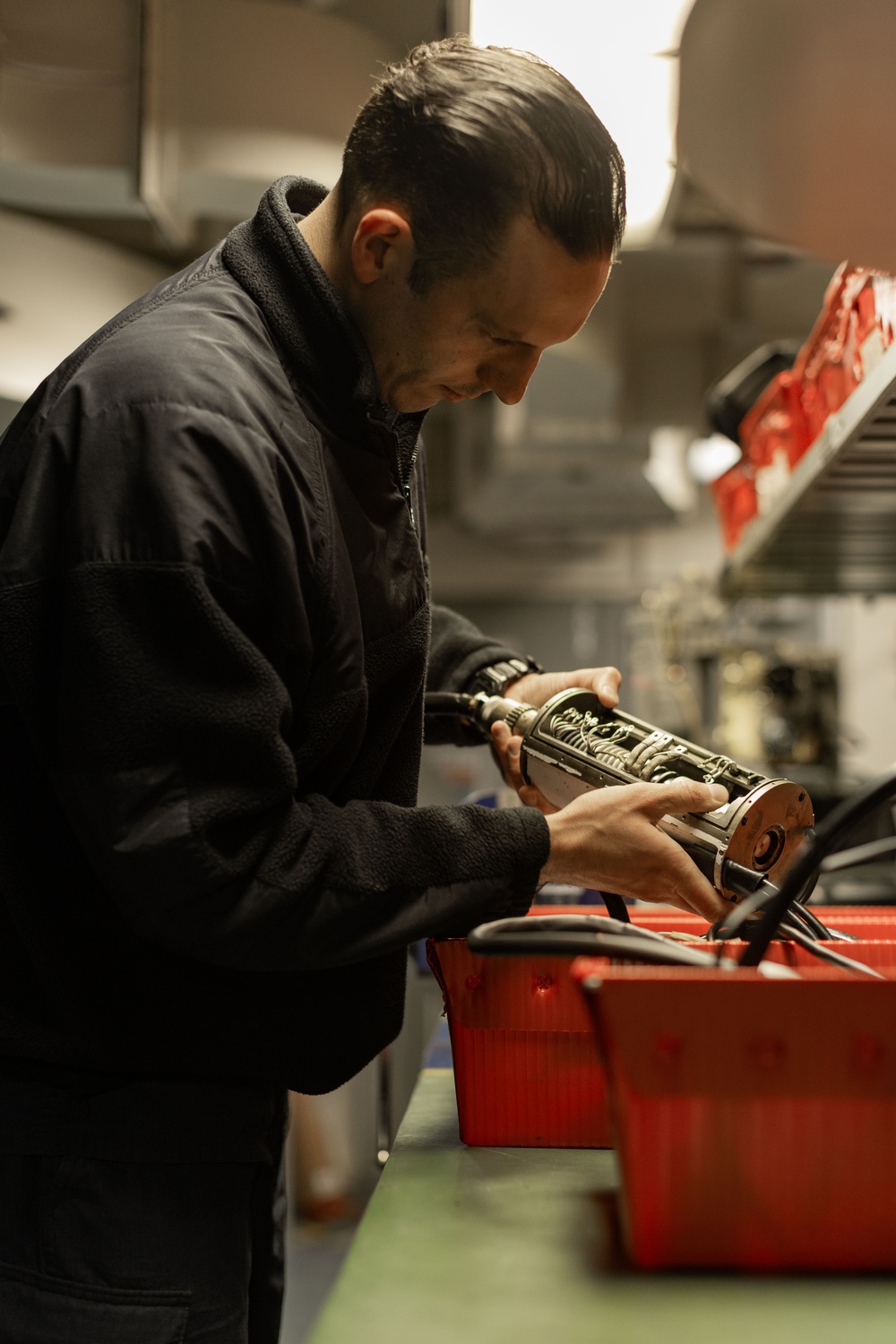 USS Gerald R. Ford (CVN 78) Sailor Conducts Maintenance