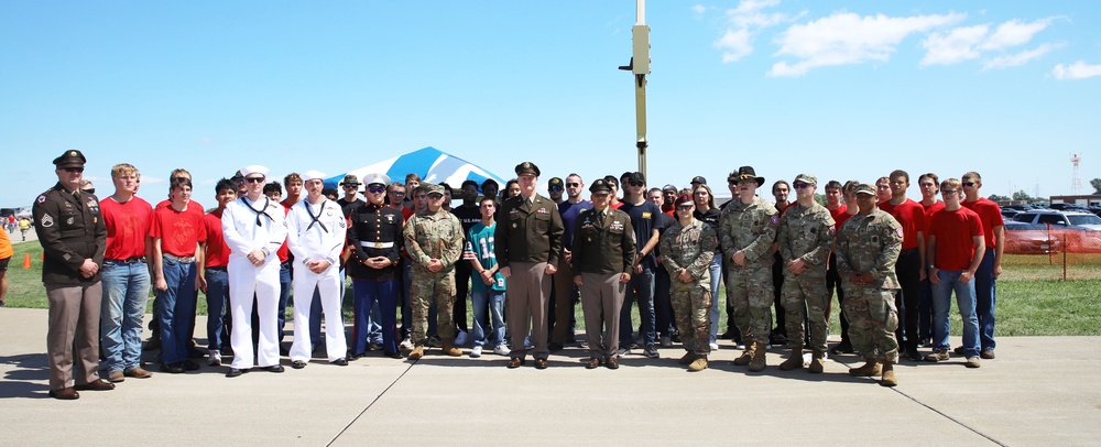 Service Begins: Enlistees sworn in during air show