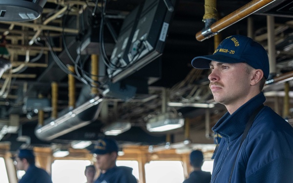 U.S. Coast Guard Cutter Healy transfers passengers offshore Nome