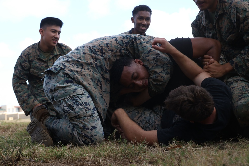 Marine Aircraft Group 24 Marines participate in physical training