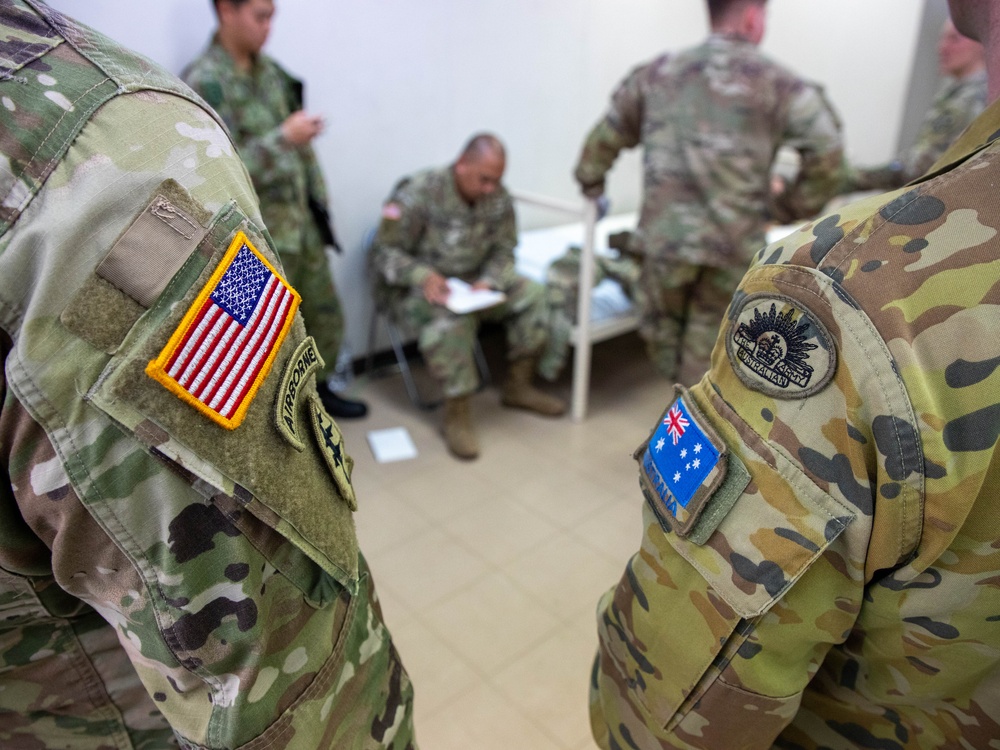 Medical personnel provide care during the Trilateral CASEVAC Training at Camp Asaka, Japan, Aug. 21, 2025.