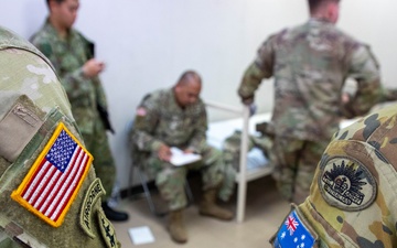Medical personnel provide care during the Trilateral CASEVAC Training at Camp Asaka, Japan, Aug. 21, 2025.
