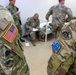 Medical personnel provide care during the Trilateral CASEVAC Training at Camp Asaka, Japan, Aug. 21, 2025.