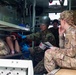 Medical personnel provide care during the Trilateral CASEVAC Training at Camp Asaka, Japan, Aug. 21, 2025.