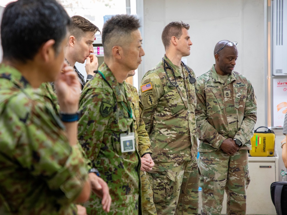 Medical personnel provide care during the Trilateral CASEVAC Training at Camp Asaka, Japan, Aug. 21, 2025.
