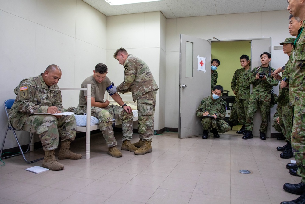 Medical personnel provide care during the Trilateral CASEVAC Training at Camp Asaka, Japan, Aug. 21, 2025.