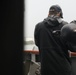 Sailors aboard the USS John Finn conduct a sea and anchor detail in Sembawang, Singapore
