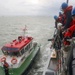 Sailors aboard the USS John Finn conduct a sea and anchor detail in Sembawang, Singapore