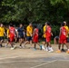 USS Frank Cable (AS 40) Sailors participate in sports with Guru Nanak College students
