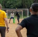 USS Frank Cable (AS 40) Sailors participate in sports with Guru Nanak College students