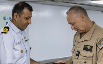 USS Frank Cable (AS 40) gift exchange with Indian Navy