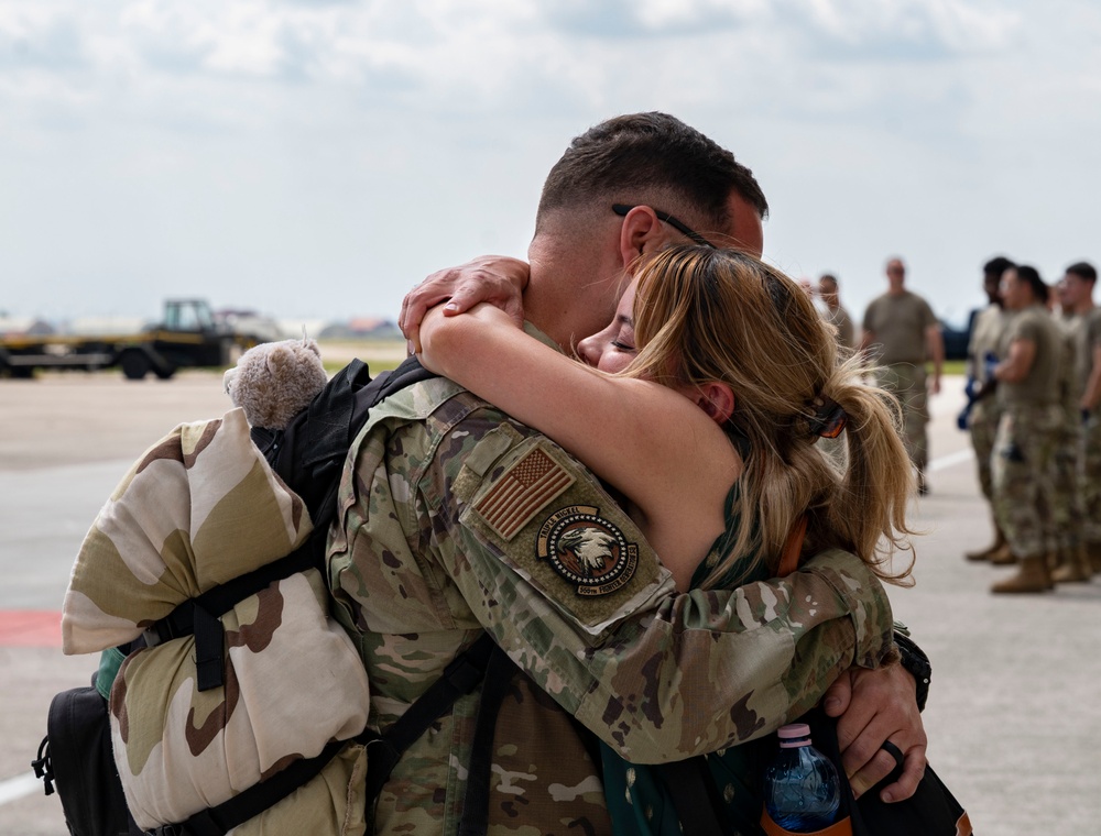 Friends and family welcome 555th FS personnel home