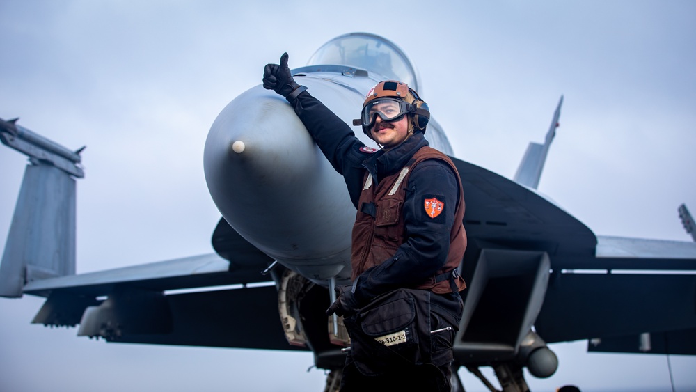 VFA-87 Sailor Signals Jet Ready For Launch