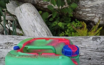 Coast Guard investigates a report of unknown containers on and near Montague Island, Alaska