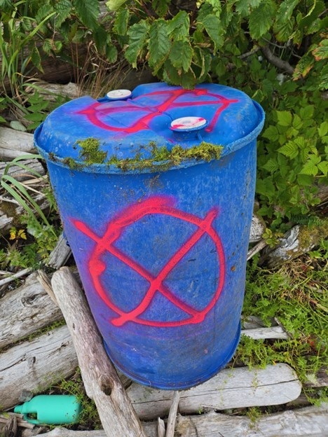 Coast Guard investigates a report of unknown containers on and near Montague Island, Alaska