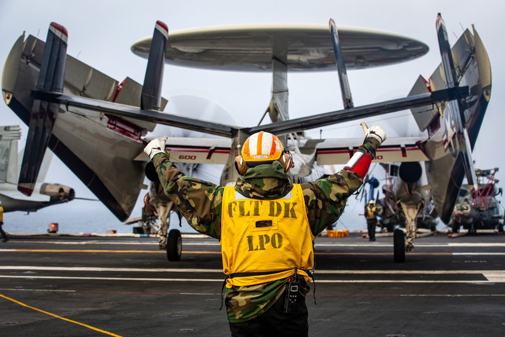 USS Gerald R. Ford (CVN 78) Sailor Signals To Hawkeye