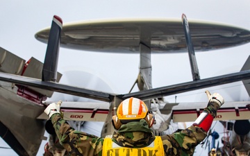 USS Gerald R. Ford (CVN 78) Sailor Signals To Hawkeye