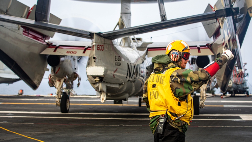USS Gerald R. Ford (CVN 78) Sailor Signals To Hawkeye