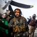 VAW-124 Sailor Greets Flight Deck Crew
