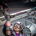 USS Gerald R. Ford (CVN 78) Sailor Lowers Fueling Hose