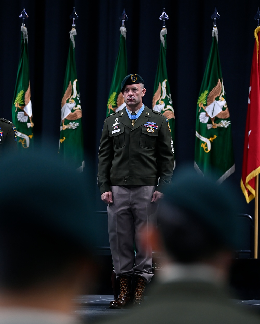 Soldiers Don Green Beret During Special Forces Graduation