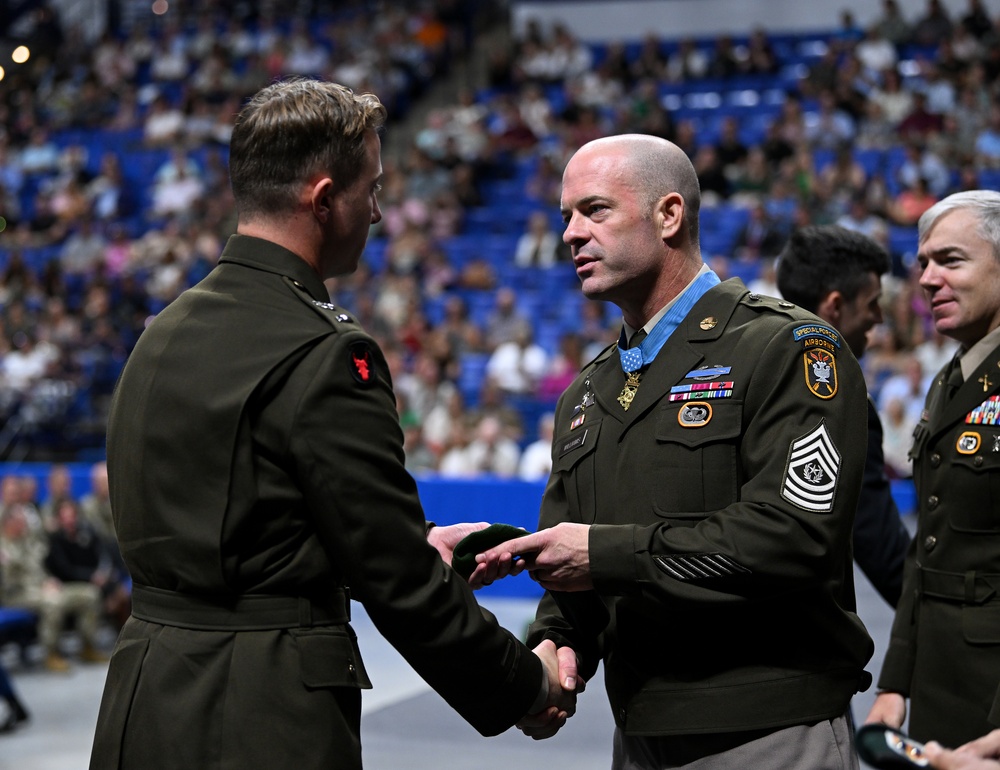 Soldiers Don Green Beret During Special Forces Graduation