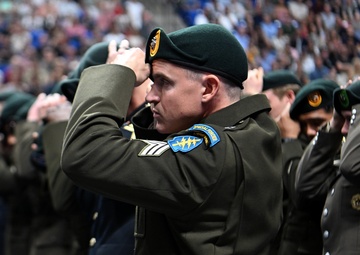 Soldiers Don Green Beret During Special Forces Graduation