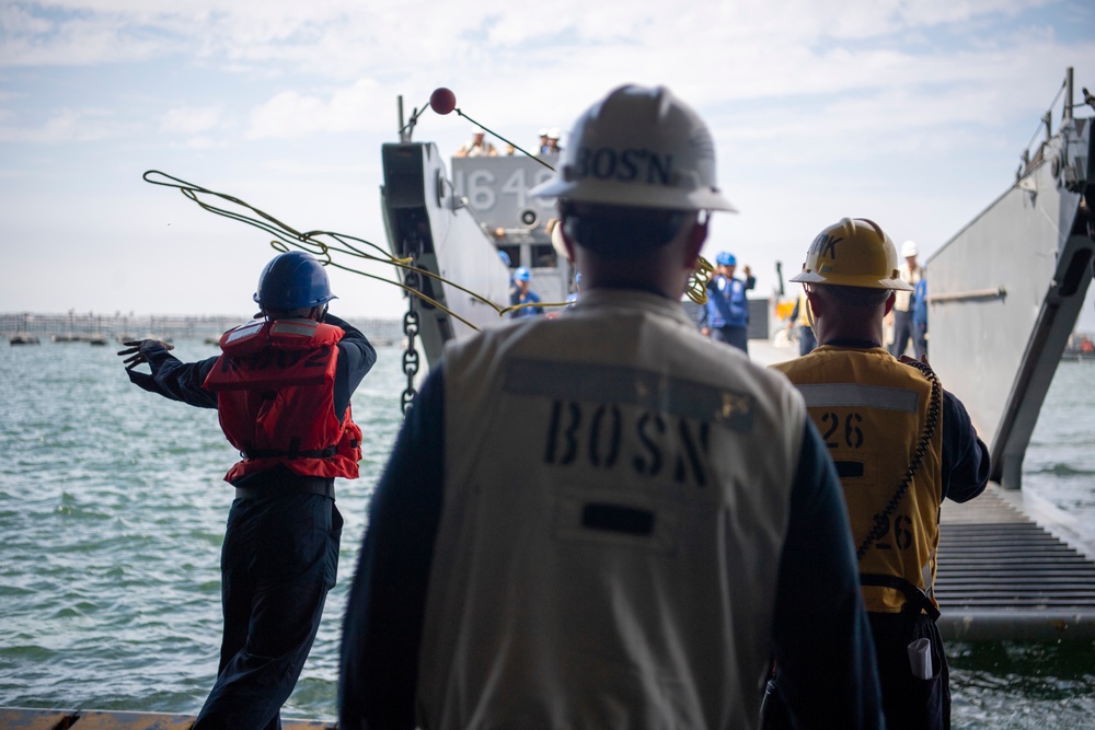 USS John P Murtha conducts stern gate marriage with Assault Craft Unit 1