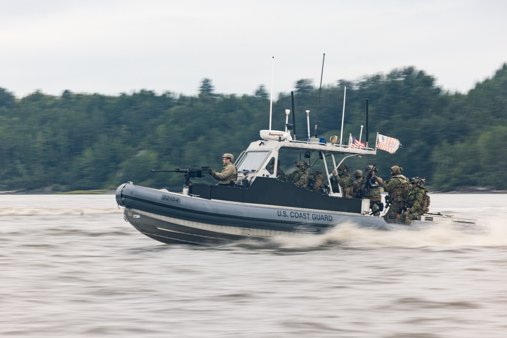 U.S. Marines with 3rd Bn., 4th Marines, and U.S. Coast Guard with PSU 311 conduct amphibious raid during ARCTIC EDGE 2025