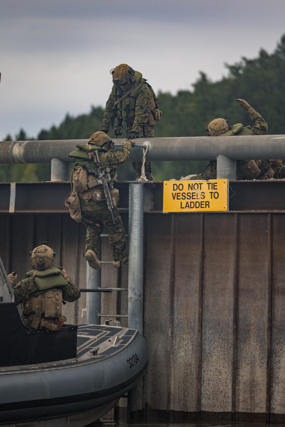 U.S. Marines with 3rd Bn., 4th Marines, U.S. Coast Guard with PSU 311 conduct amphibious raid during ARCTIC EDGE 2025