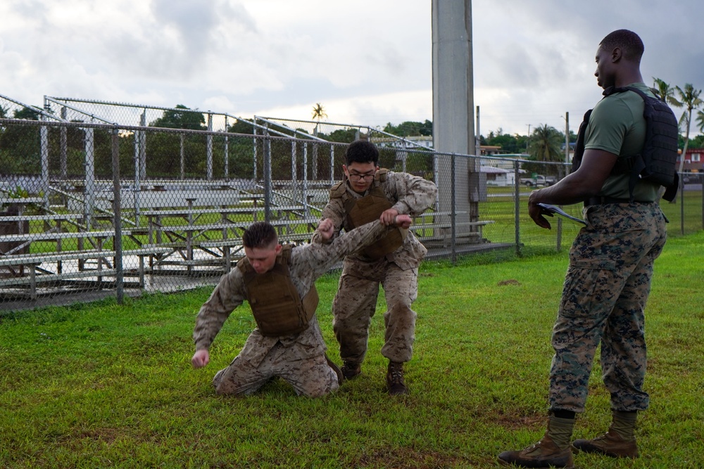 Camp Blaz Marines participate in a MCMAP grey belt test
