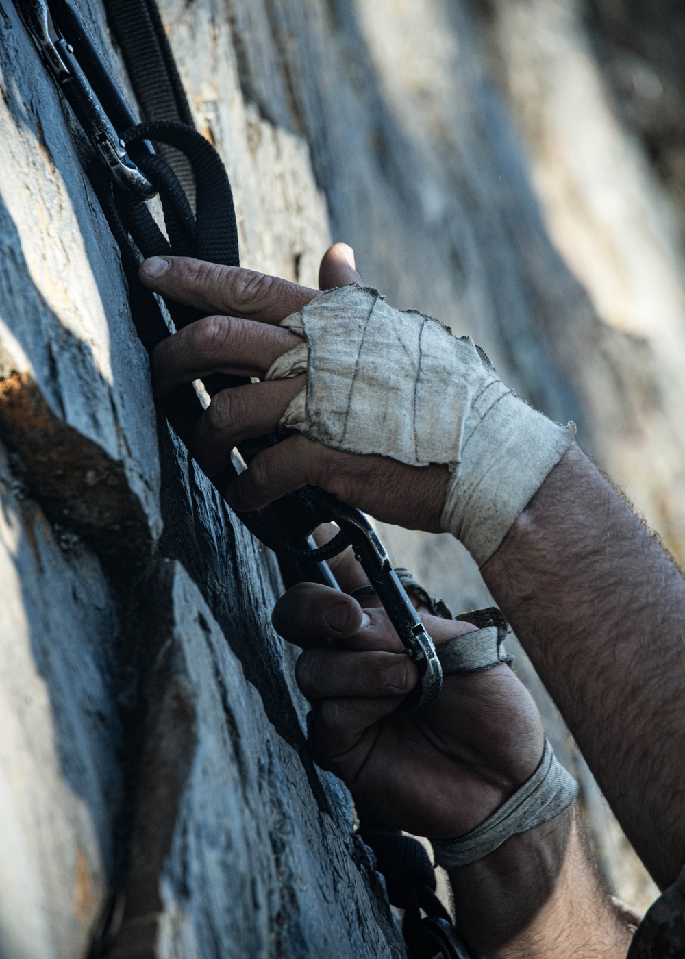V35 and V11 Marines conduct lead climbing during Assault Climbers Course