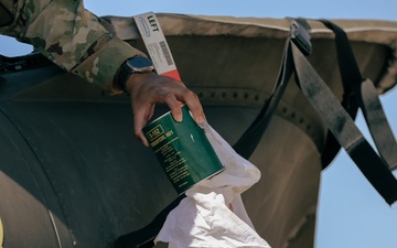 U.S. Army Soldiers conduct maintenance on a UH-60 Blackhawk