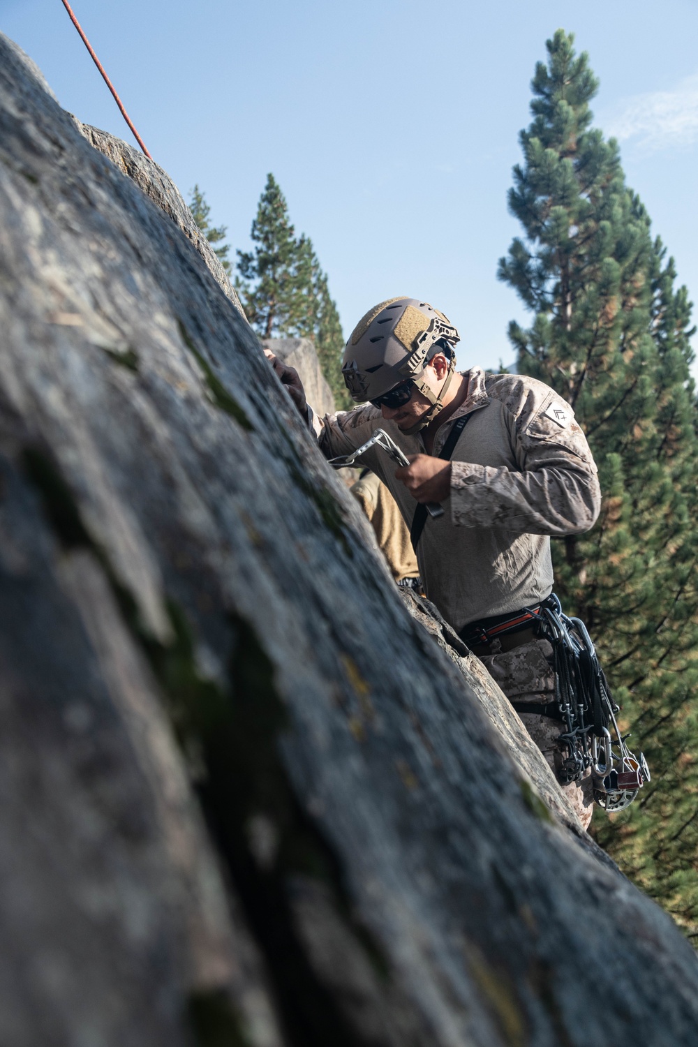 V35 and V11 Marines conduct lead climbing during Assault Climbers Course