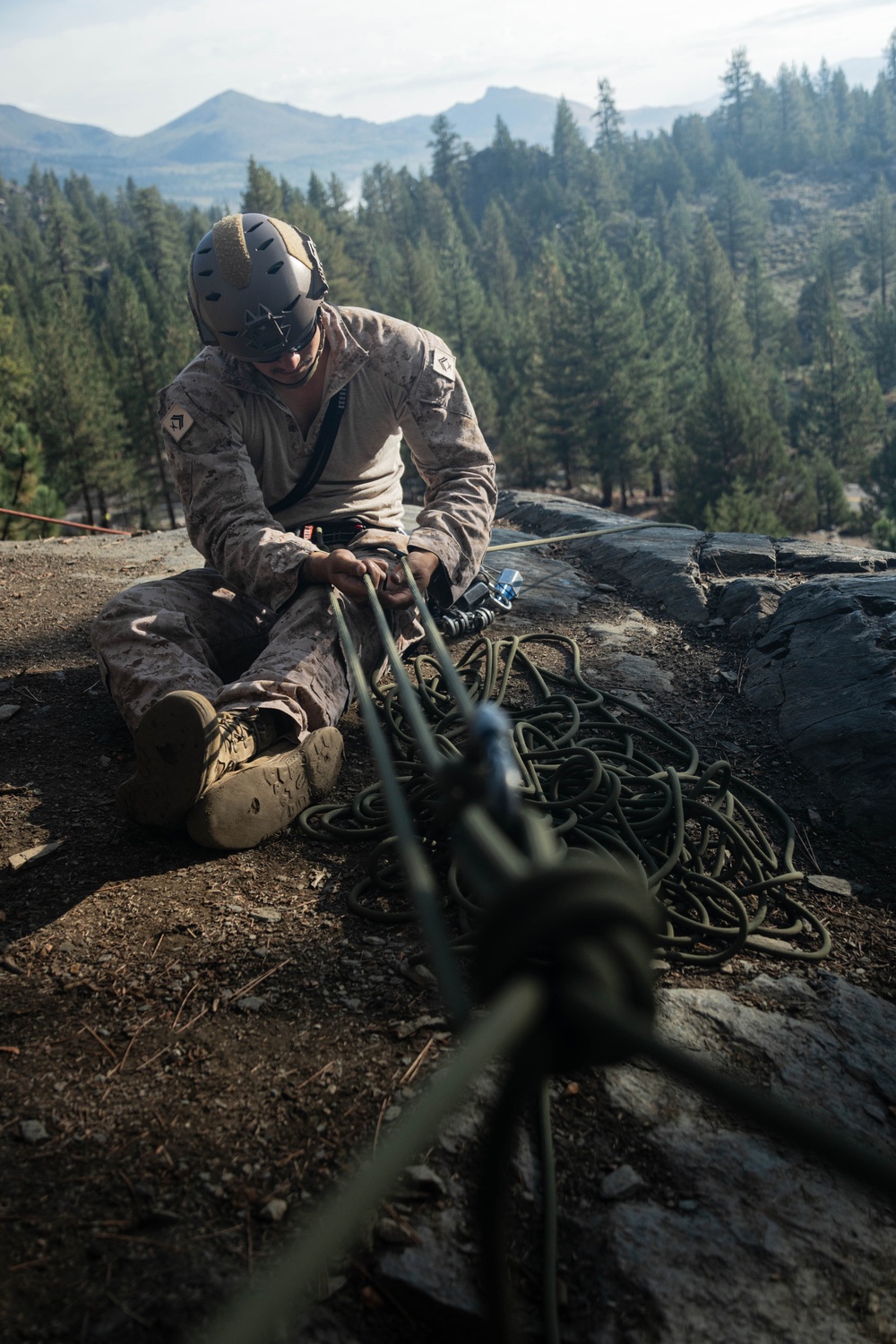 V35 and V11 Marines conduct lead climbing during Assault Climbers Course