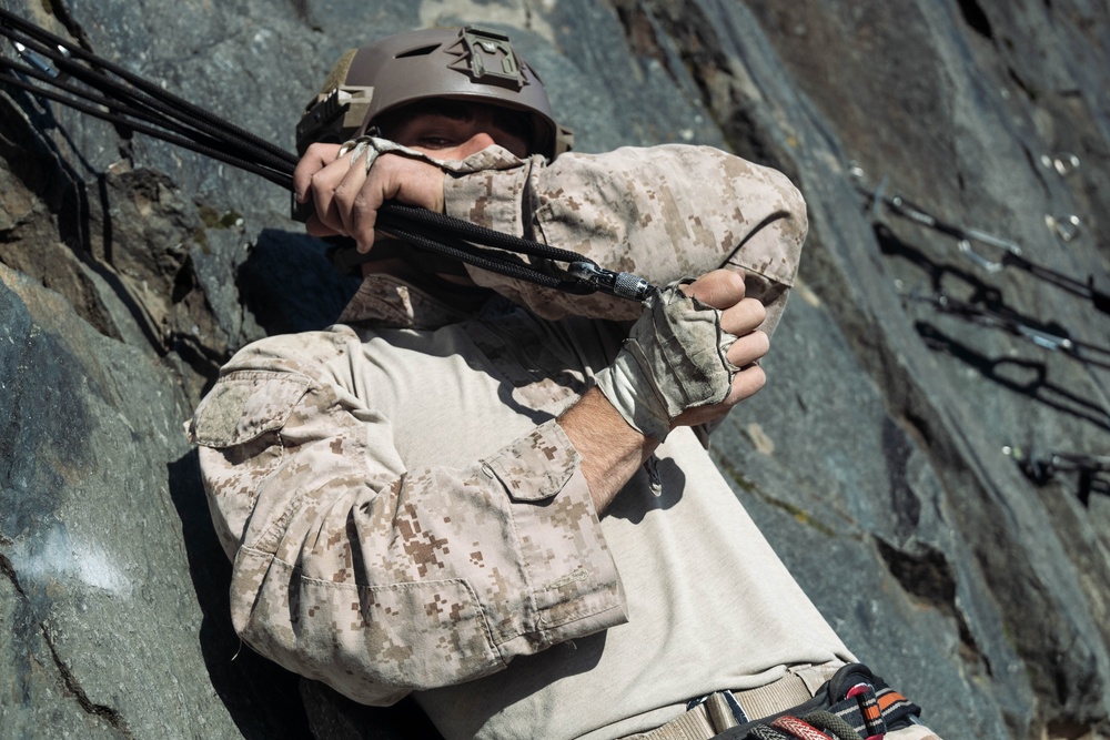 V35 and V11 Marines conduct lead climbing during Assault Climbers Course