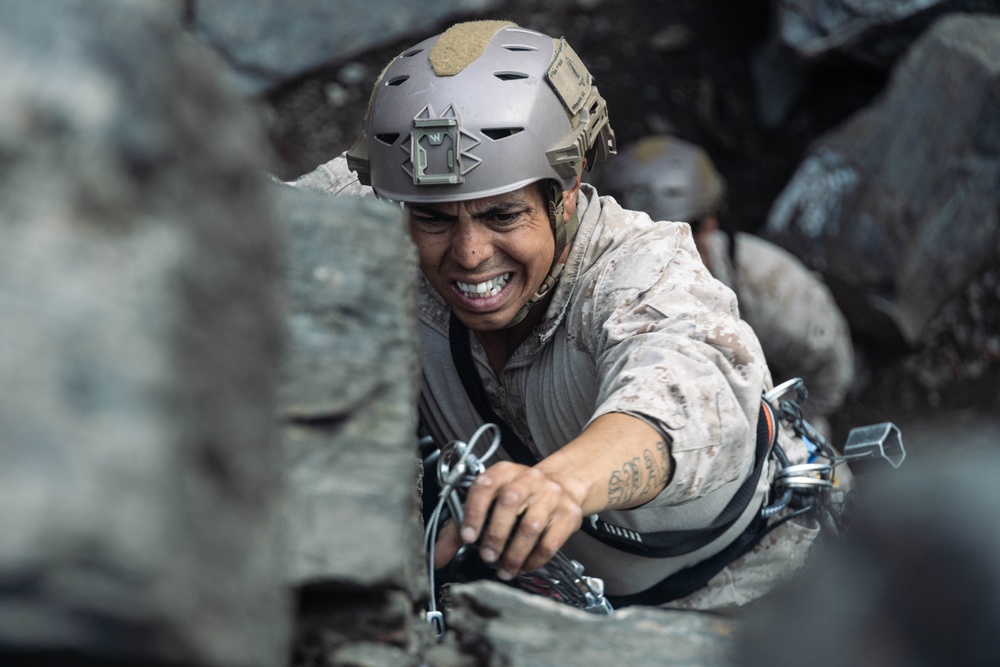 V35 and V11 Marines conduct lead climbing during Assault Climbers Course