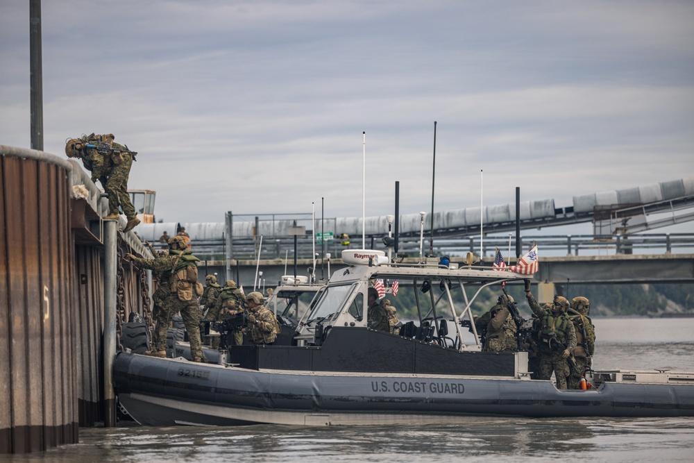 U.S. Marines with 3rd Bn., 4th Marines, and U.S. Coast Guardsmen with PSU 311 conduct amphibious raid during ARCTIC EDGE 2025